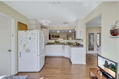 Welcome to this stunning two bedroom, two bath villa nestled in on Highland Lakes Executive Golf Course in Florida - for sale on GolfHomes.com, golf home, golf lot