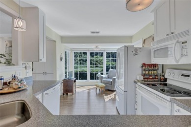 Welcome to this stunning two bedroom, two bath villa nestled in on Highland Lakes Executive Golf Course in Florida - for sale on GolfHomes.com, golf home, golf lot