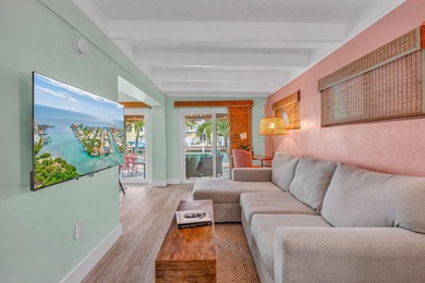 Step inside and experience the kind of tropical ease people on Key Colony Beach Golf Course in Florida - for sale on GolfHomes.com, golf home, golf lot