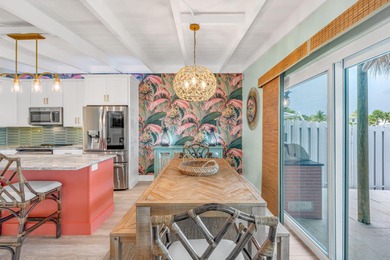 Step inside and experience the kind of tropical ease people on Key Colony Beach Golf Course in Florida - for sale on GolfHomes.com, golf home, golf lot