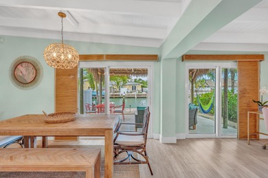 Step inside and experience the kind of tropical ease people on Key Colony Beach Golf Course in Florida - for sale on GolfHomes.com, golf home, golf lot