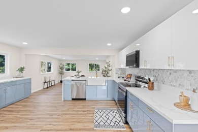 Step into this beautifully renovated two-story home, offering on Hilo Municipal Golf Course in Hawaii - for sale on GolfHomes.com, golf home, golf lot