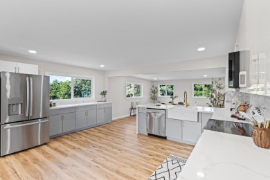 Step into this beautifully renovated two-story home, offering on Hilo Municipal Golf Course in Hawaii - for sale on GolfHomes.com, golf home, golf lot