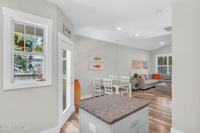 Welcome to 207 NE 67th Street, Oak Island - a warm and inviting on Founders Club At St. James Plantation in North Carolina - for sale on GolfHomes.com, golf home, golf lot