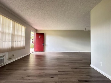 Buy this 1st floor condo 1 bedroom 1.5 baths 1 parking space on Flamingo Lakes Country Club in Florida - for sale on GolfHomes.com, golf home, golf lot