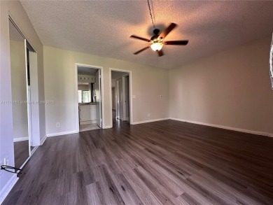 Buy this 1st floor condo 1 bedroom 1.5 baths 1 parking space on Flamingo Lakes Country Club in Florida - for sale on GolfHomes.com, golf home, golf lot
