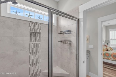 Welcome to 207 NE 67th Street, Oak Island - a warm and inviting on Founders Club At St. James Plantation in North Carolina - for sale on GolfHomes.com, golf home, golf lot