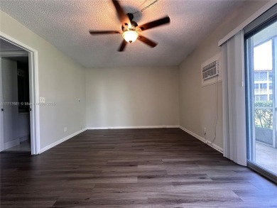 Buy this 1st floor condo 1 bedroom 1.5 baths 1 parking space on Flamingo Lakes Country Club in Florida - for sale on GolfHomes.com, golf home, golf lot