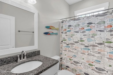 Welcome to 207 NE 67th Street, Oak Island - a warm and inviting on Founders Club At St. James Plantation in North Carolina - for sale on GolfHomes.com, golf home, golf lot