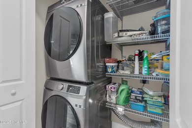 Welcome to 207 NE 67th Street, Oak Island - a warm and inviting on Founders Club At St. James Plantation in North Carolina - for sale on GolfHomes.com, golf home, golf lot