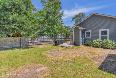 Welcome to 207 NE 67th Street, Oak Island - a warm and inviting on Founders Club At St. James Plantation in North Carolina - for sale on GolfHomes.com, golf home, golf lot
