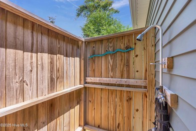 Welcome to 207 NE 67th Street, Oak Island - a warm and inviting on Founders Club At St. James Plantation in North Carolina - for sale on GolfHomes.com, golf home, golf lot