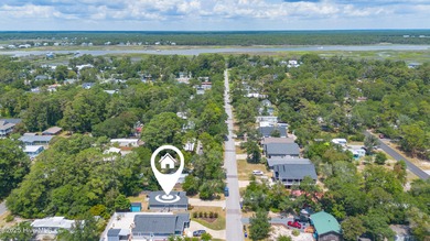 Welcome to 207 NE 67th Street, Oak Island - a warm and inviting on Founders Club At St. James Plantation in North Carolina - for sale on GolfHomes.com, golf home, golf lot