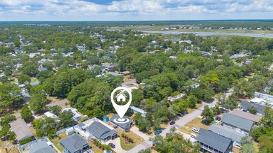 Welcome to 207 NE 67th Street, Oak Island - a warm and inviting on Founders Club At St. James Plantation in North Carolina - for sale on GolfHomes.com, golf home, golf lot