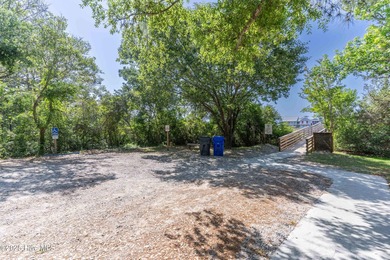 Welcome to 207 NE 67th Street, Oak Island - a warm and inviting on Founders Club At St. James Plantation in North Carolina - for sale on GolfHomes.com, golf home, golf lot