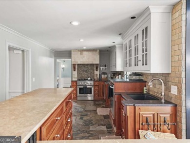 This stunning, spacious, all brick updated home in an amazing on Dunwoody Country Club in Georgia - for sale on GolfHomes.com, golf home, golf lot