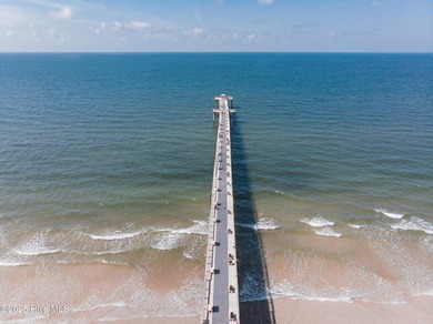 Welcome to 207 NE 67th Street, Oak Island - a warm and inviting on Founders Club At St. James Plantation in North Carolina - for sale on GolfHomes.com, golf home, golf lot