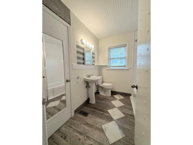 Discover this beautifully updated 3-bedroom, 1-bath Bedford on Arlington Association in Kentucky - for sale on GolfHomes.com, golf home, golf lot