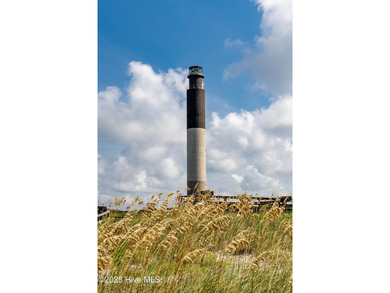 Welcome to 207 NE 67th Street, Oak Island - a warm and inviting on Founders Club At St. James Plantation in North Carolina - for sale on GolfHomes.com, golf home, golf lot