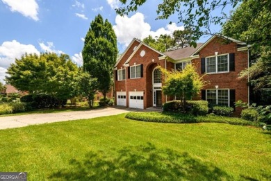 Nestled in the prestigious Southland Golf and Country Club on Southland Country Club in Georgia - for sale on GolfHomes.com, golf home, golf lot