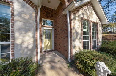 This beautifully maintained 4-bedroom, 2-bath traditional brick on Hide-A-Way Lake Golf Course in Texas - for sale on GolfHomes.com, golf home, golf lot