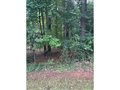 NICE BUILDABLE LOT ! Looking to build your new home? This lot is on River Golf and Country Club at Lake Royale in North Carolina - for sale on GolfHomes.com, golf home, golf lot