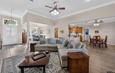 This beautifully maintained 4-bedroom, 2-bath traditional brick on Hide-A-Way Lake Golf Course in Texas - for sale on GolfHomes.com, golf home, golf lot