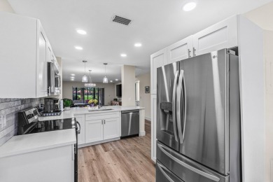 NEW ON THE MARKET - Fully renovated 1st floor 2BR/2BA condo with on Hunters Run Golf and Country Club in Florida - for sale on GolfHomes.com, golf home, golf lot