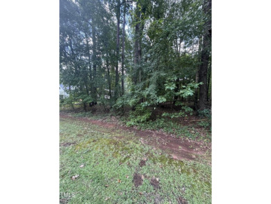 NICE BUILDABLE LOT ! Looking to build your new home? This lot is on River Golf and Country Club at Lake Royale in North Carolina - for sale on GolfHomes.com, golf home, golf lot