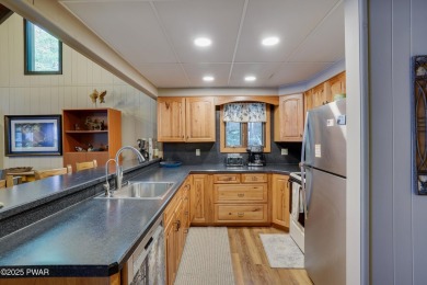 Welcome to your serene lakeside retreat in the highly desirable on Paupack Hills Golf and Country Club in Pennsylvania - for sale on GolfHomes.com, golf home, golf lot
