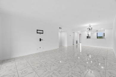 Beautifully renovated home with an amazing lake and golf view in on  in Florida - for sale on GolfHomes.com, golf home, golf lot