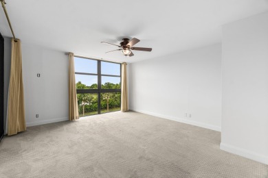 Beautifully renovated home with an amazing lake and golf view in on  in Florida - for sale on GolfHomes.com, golf home, golf lot