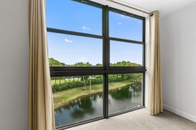 Beautifully renovated home with an amazing lake and golf view in on  in Florida - for sale on GolfHomes.com, golf home, golf lot