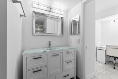 Beautifully renovated home with an amazing lake and golf view in on  in Florida - for sale on GolfHomes.com, golf home, golf lot