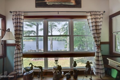 Welcome to your serene lakeside retreat in the highly desirable on Paupack Hills Golf and Country Club in Pennsylvania - for sale on GolfHomes.com, golf home, golf lot