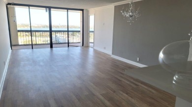 Location, Location, Location! This beautifully updated 2-bedroom on The President Country Club in Florida - for sale on GolfHomes.com, golf home, golf lot