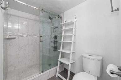 Beautifully renovated home with an amazing lake and golf view in on  in Florida - for sale on GolfHomes.com, golf home, golf lot
