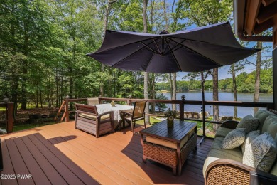 Welcome to your serene lakeside retreat in the highly desirable on Paupack Hills Golf and Country Club in Pennsylvania - for sale on GolfHomes.com, golf home, golf lot