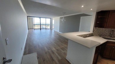 Location, Location, Location! This beautifully updated 2-bedroom on The President Country Club in Florida - for sale on GolfHomes.com, golf home, golf lot