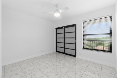 Beautifully renovated home with an amazing lake and golf view in on  in Florida - for sale on GolfHomes.com, golf home, golf lot