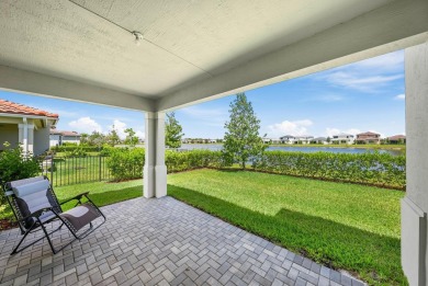 Stunning lakefront home in the gorgeous gated golf community of on The Tesoro Golf Course and Club in Florida - for sale on GolfHomes.com, golf home, golf lot