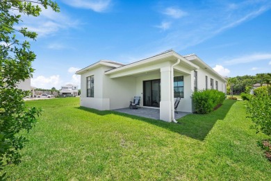 Stunning lakefront home in the gorgeous gated golf community of on The Tesoro Golf Course and Club in Florida - for sale on GolfHomes.com, golf home, golf lot