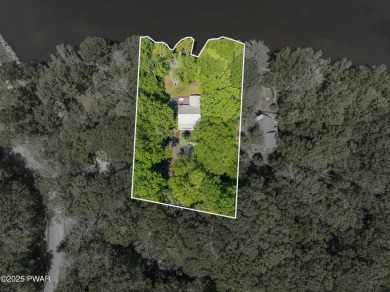 Welcome to your serene lakeside retreat in the highly desirable on Paupack Hills Golf and Country Club in Pennsylvania - for sale on GolfHomes.com, golf home, golf lot