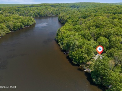Welcome to your serene lakeside retreat in the highly desirable on Paupack Hills Golf and Country Club in Pennsylvania - for sale on GolfHomes.com, golf home, golf lot