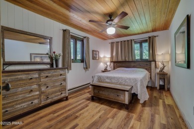 Welcome to your serene lakeside retreat in the highly desirable on Paupack Hills Golf and Country Club in Pennsylvania - for sale on GolfHomes.com, golf home, golf lot
