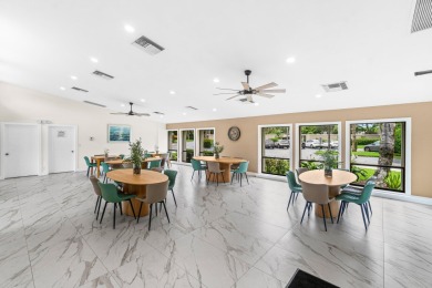 Beautifully renovated home with an amazing lake and golf view in on  in Florida - for sale on GolfHomes.com, golf home, golf lot