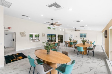 Beautifully renovated home with an amazing lake and golf view in on  in Florida - for sale on GolfHomes.com, golf home, golf lot