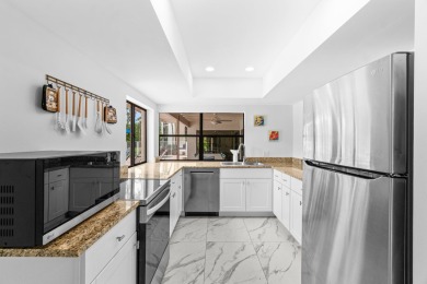 Beautifully renovated home with an amazing lake and golf view in on  in Florida - for sale on GolfHomes.com, golf home, golf lot