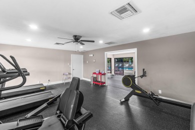 Beautifully renovated home with an amazing lake and golf view in on  in Florida - for sale on GolfHomes.com, golf home, golf lot
