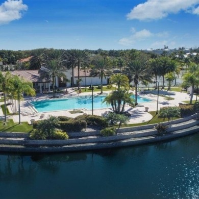 Stunning lakefront home in the gorgeous gated golf community of on The Tesoro Golf Course and Club in Florida - for sale on GolfHomes.com, golf home, golf lot